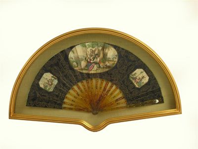 Appraisal: A fan c with pierced and decorated tortoiseshell sticks and