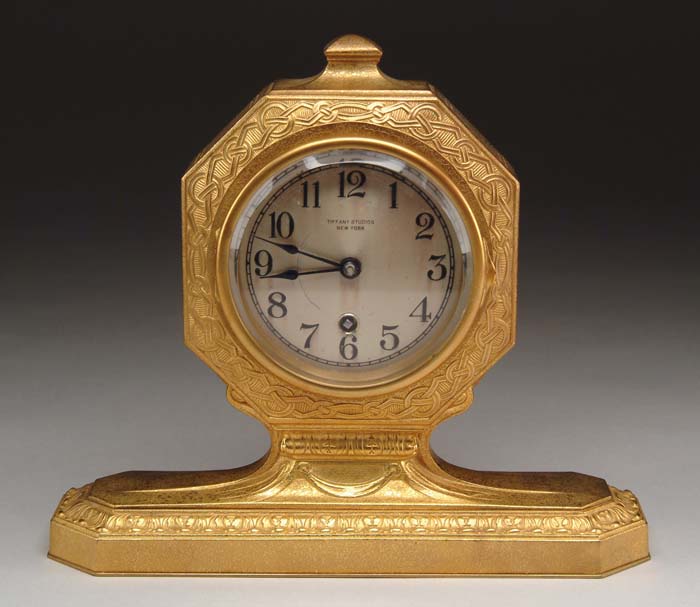 Appraisal: TIFFANY STUDIOS BRONZE MANTEL CLOCK Octagon form with interesting chain