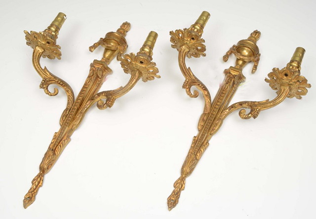 Appraisal: A PAIR OF GILT METAL TWO BRANCH WALL LIGHTS with