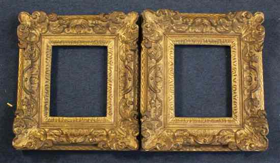 Appraisal: A pair of th century carved giltwood picture frames apertures