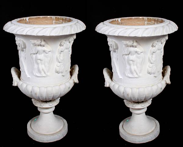 Appraisal: A pair of composite campana form urns height in