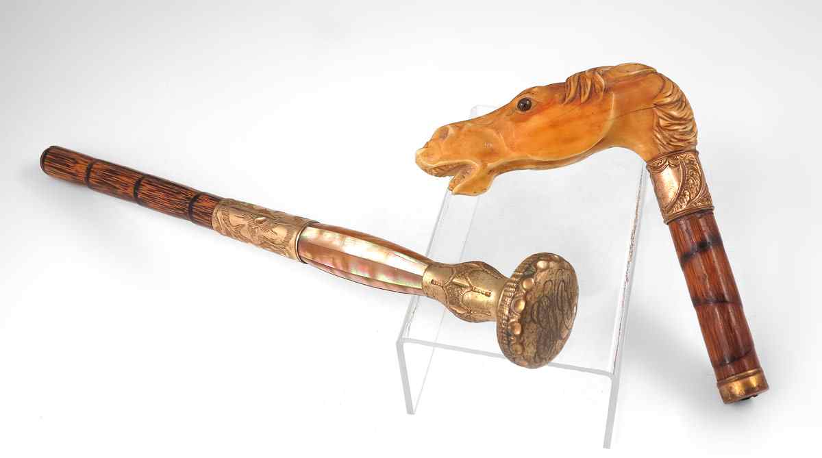 Appraisal: WALKING STICK HANDLES pieces to include Carved ivory horse head