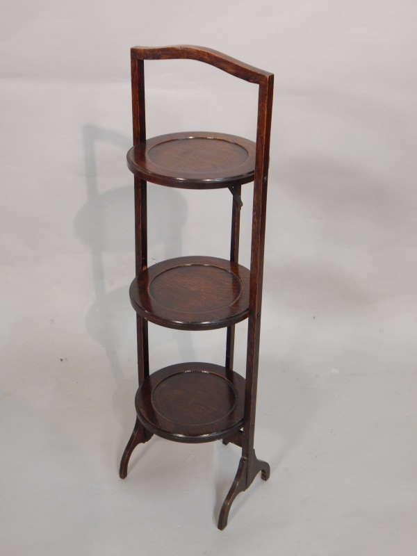 Appraisal: A 's oak three tier cake stand cm high