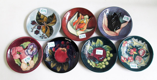 Appraisal: SEVEN MOORCROFT POTTERY DISHES hand painted under glaze in various