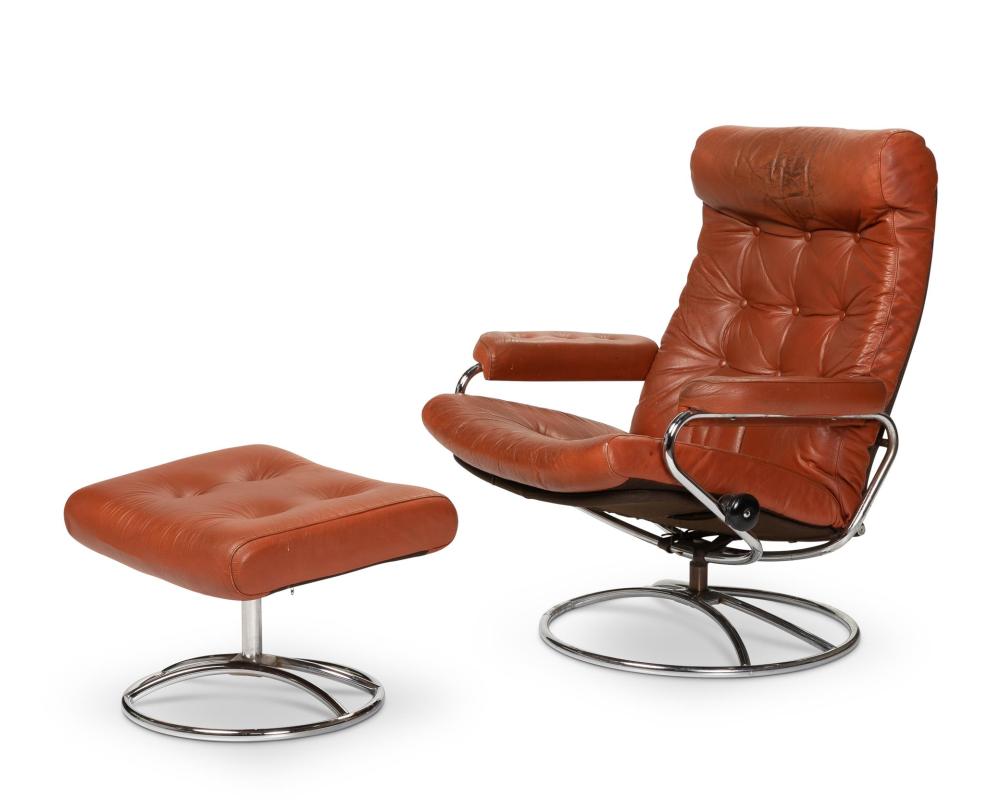 Appraisal: A modern chrome and leather armchair and ottoman th Century