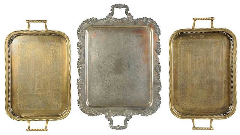 Appraisal: Three Brass and Silver Serving Trays th century one silver