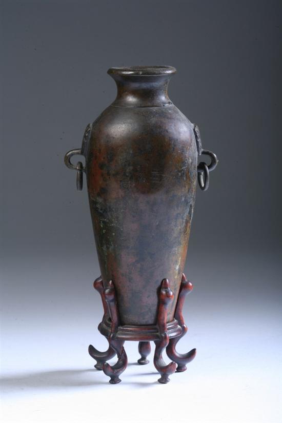 Appraisal: CHINESE BRONZE VASE Qing Dynasty Of ovoid-form flanked by tao