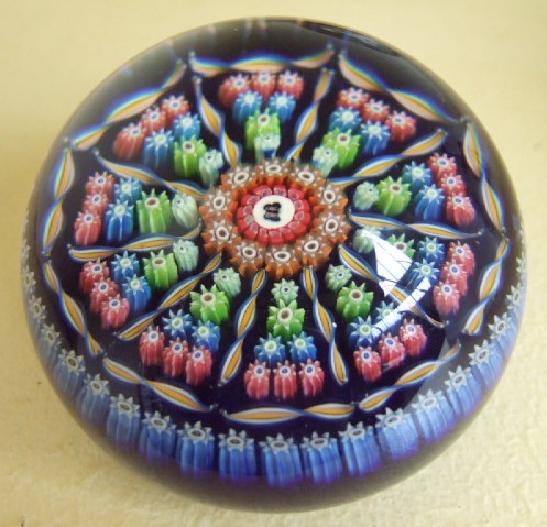 Appraisal: A Millefiori glass paperweight probably Baccarat the central cane with