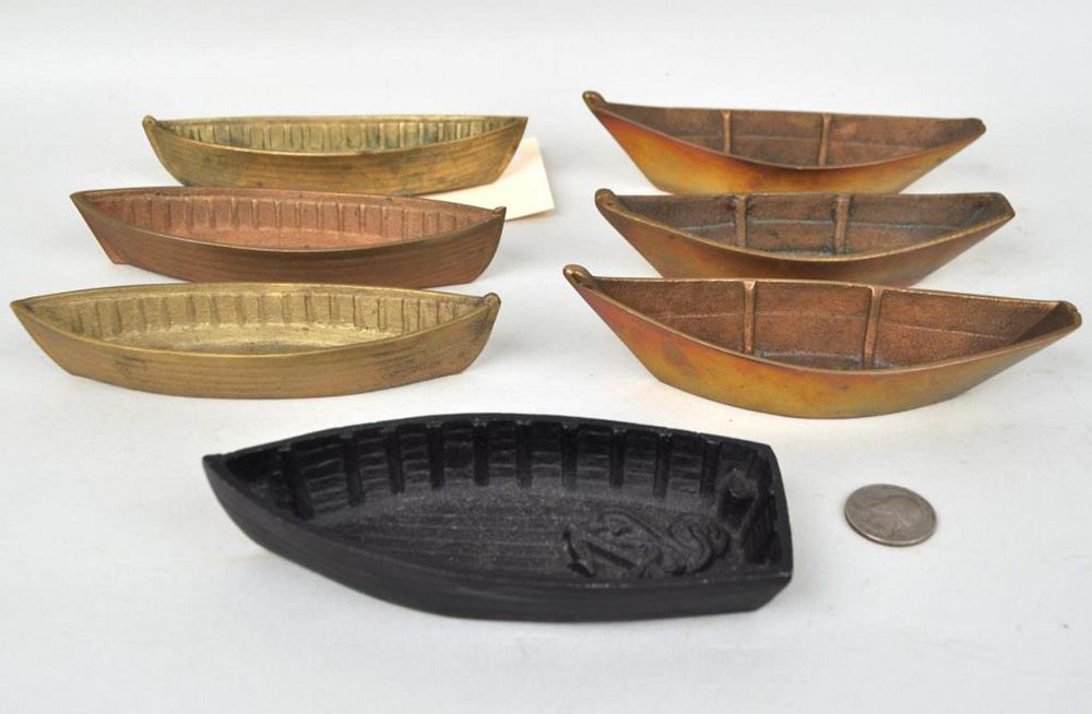 Appraisal: Seven Miniature Brass Metal Dinghies the largest long wide high