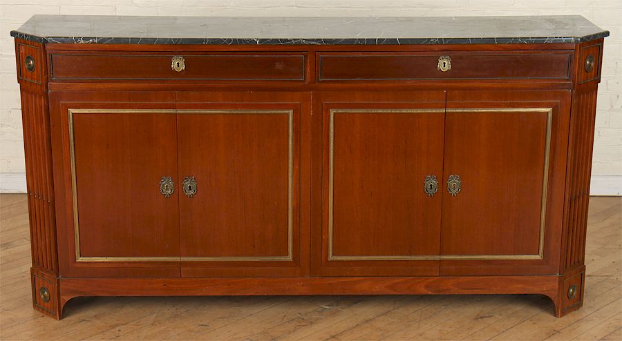 Appraisal: JANSEN MAHOGANY MARBLE TOP SIDEBOARD DIRECTOIRE A Jansen bronze mounted