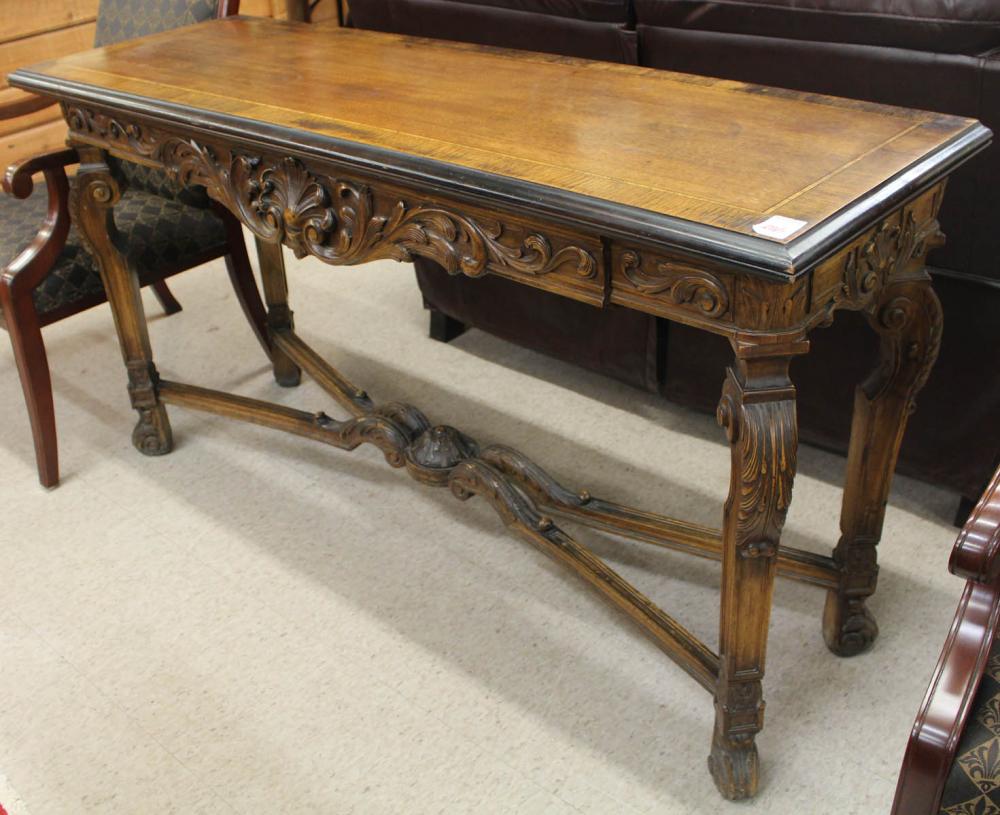 Appraisal: GEORGIAN STYLE CARVED WALNUT SOFA DINING TABLE American c 's