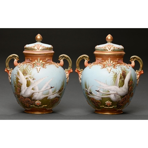 Appraisal: A pair of Royal Worcester scroll handled pot pourri vases