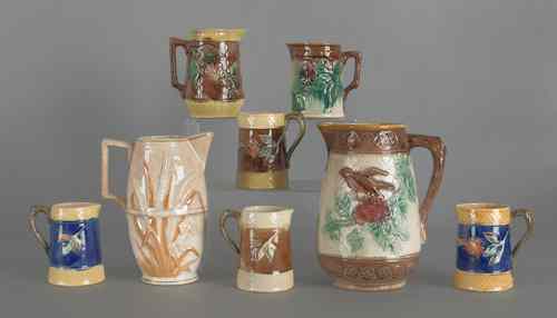 Appraisal: Eight majolica pitchers late th c tallest -