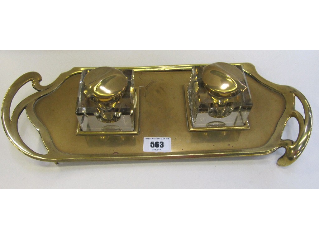 Appraisal: Art Nouveau style brass desk stand with two glass inkwells