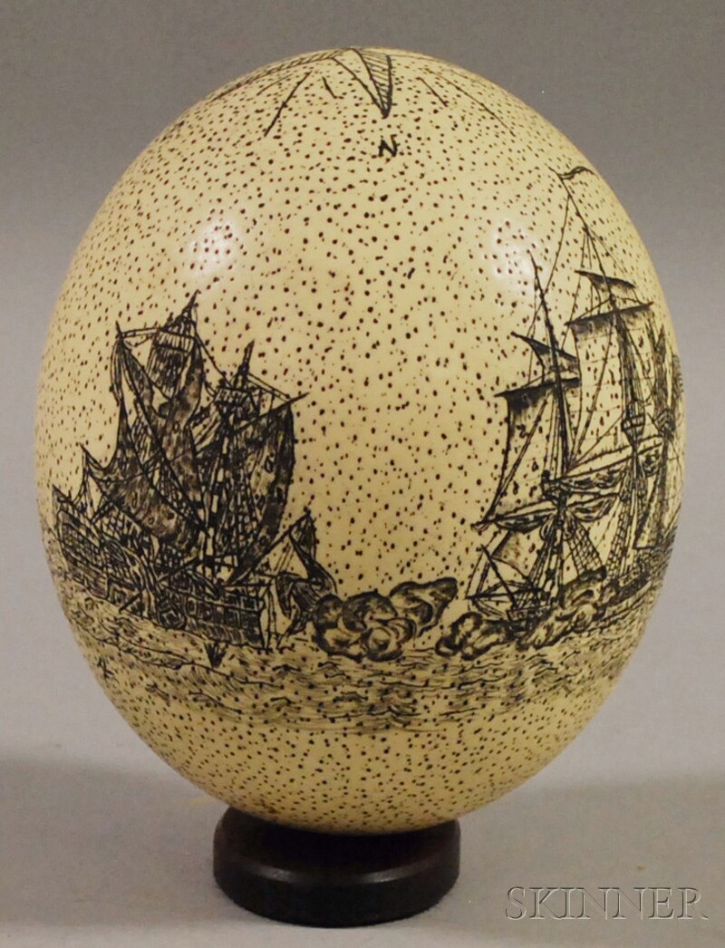 Appraisal: Scrimshaw-decorated Ostrich Egg modern depicting a compass star a naval