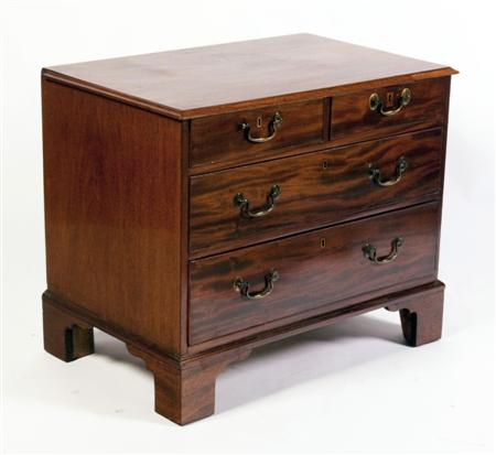 Appraisal: An adapted George III mahogany chest of small proportions the