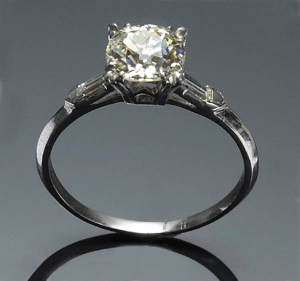 Appraisal: A diamond solitaire ring centering an old European-cut diamond weighing