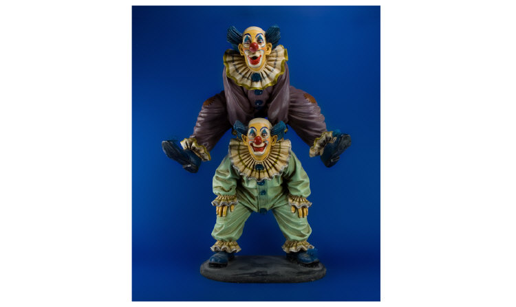 Appraisal: Jun Asilo Figure Group Of Clowns Painted Model Showing Two