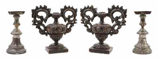 Appraisal: A Pair of Continental Carved and Silvered Wood Candlesticks each