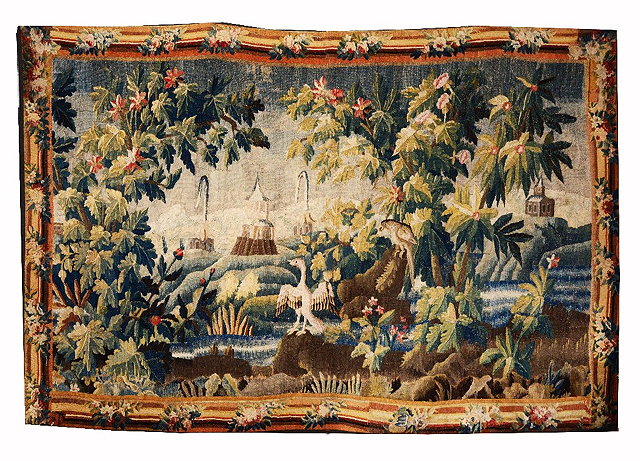 Appraisal: AN TH CENTURY FRENCH VERDURE TAPESTRY depicting an imaginative pastoral