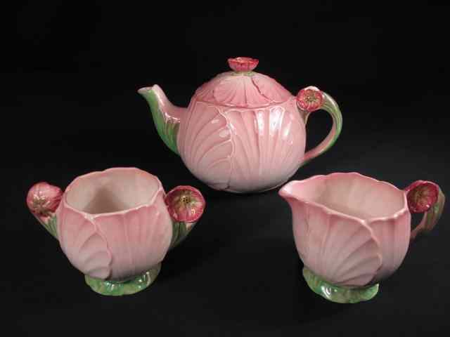 Appraisal: Carlton Ware porcelain teapot sugar and creamer Pink floral pattern