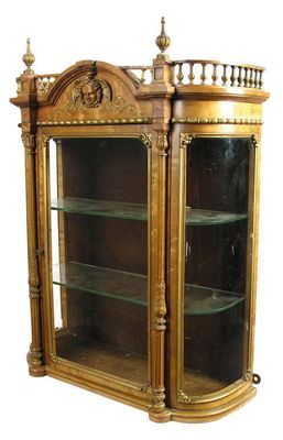 Appraisal: A Victorian bird's eye maple and parcel gilt wall cabinet