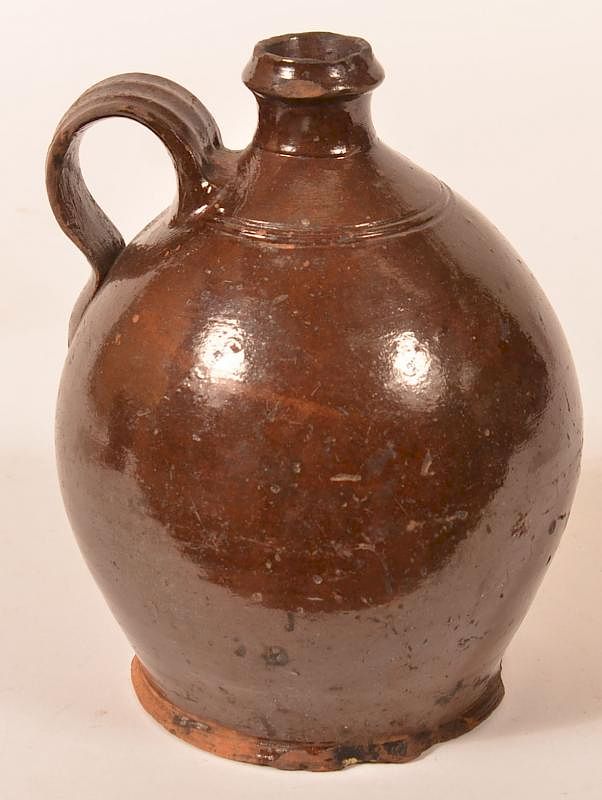 Appraisal: Pennsylvania th Century Glazed Redware Jug Pennsylvania th Century Glazed