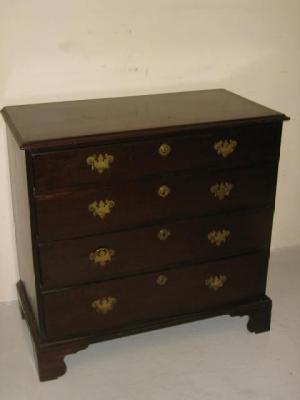 Appraisal: A MAHOGANY CHEST early th century four graduated drawers with