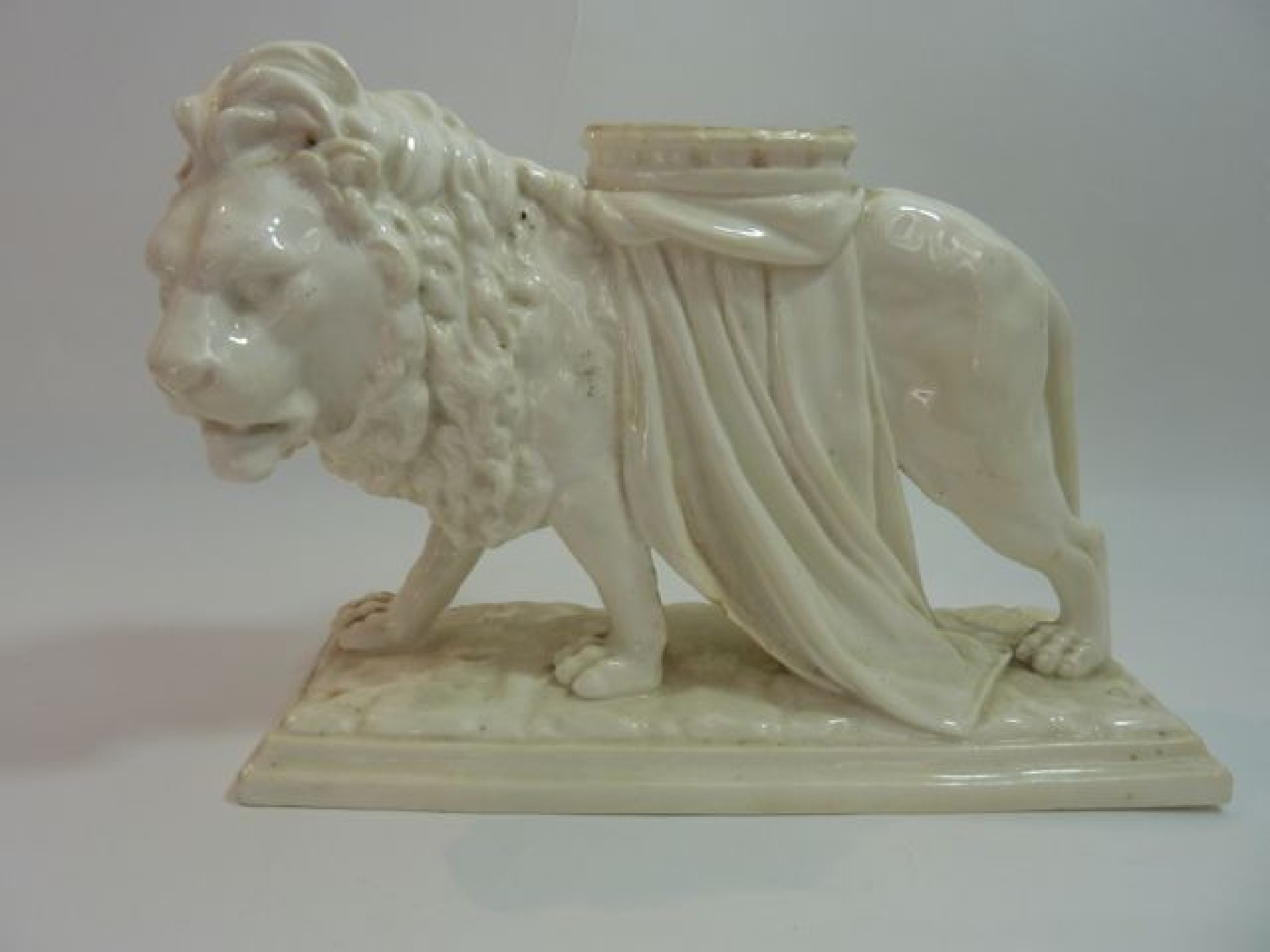 Appraisal: A Royal Worcester white glazed table centre piece in the