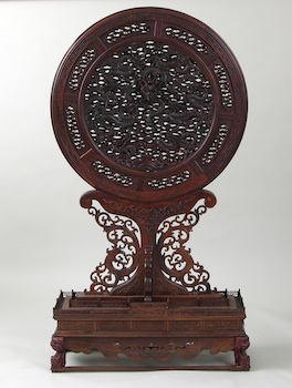 Appraisal: An Elaborate Chinese Carved Wooden Floor Standing Screen An elaborate