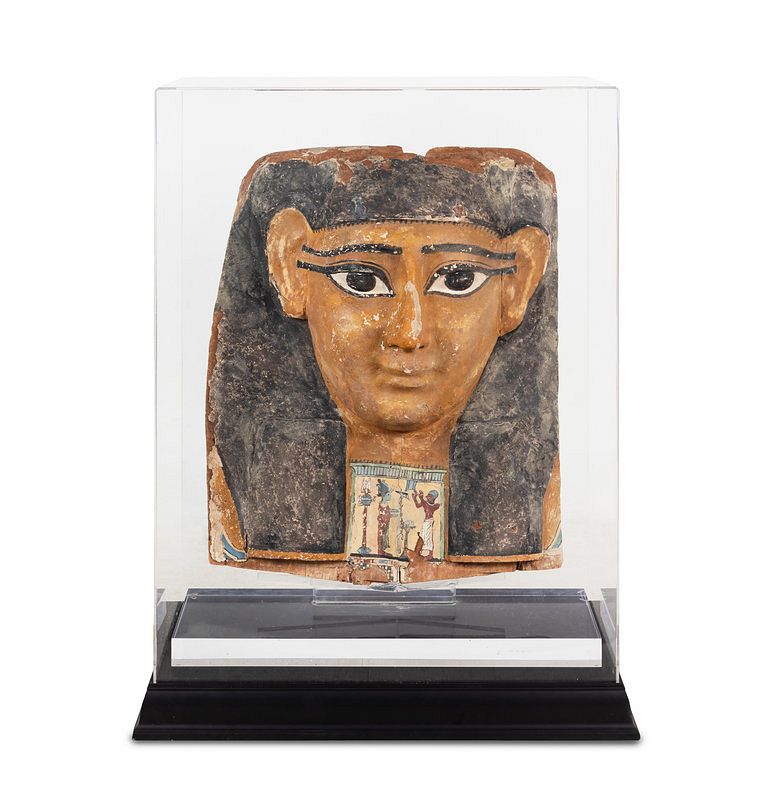 Appraisal: An Egyptian Cartonnage Mummy Mask An Egyptian Cartonnage Mummy Mask