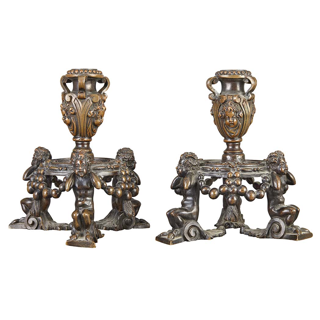 Appraisal: Pair of Italian Bronze Candlesticks In the style of Niccolo