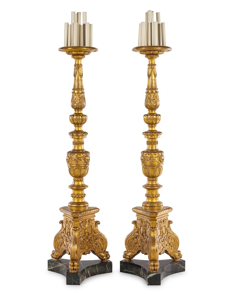 Appraisal: A Pair of Italian Baroque Style Giltwood Torcheres A Pair