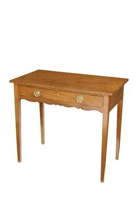 Appraisal: An early th century mahogany side table with a frieze