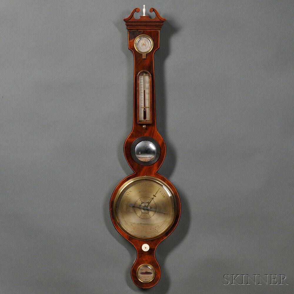 Appraisal: L-Caminada Mahogany Wheel Barometer the broken swan's neck pediment over