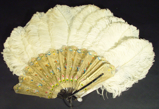 Appraisal: Ostrich feather fan with mother of pearl guard sticks and