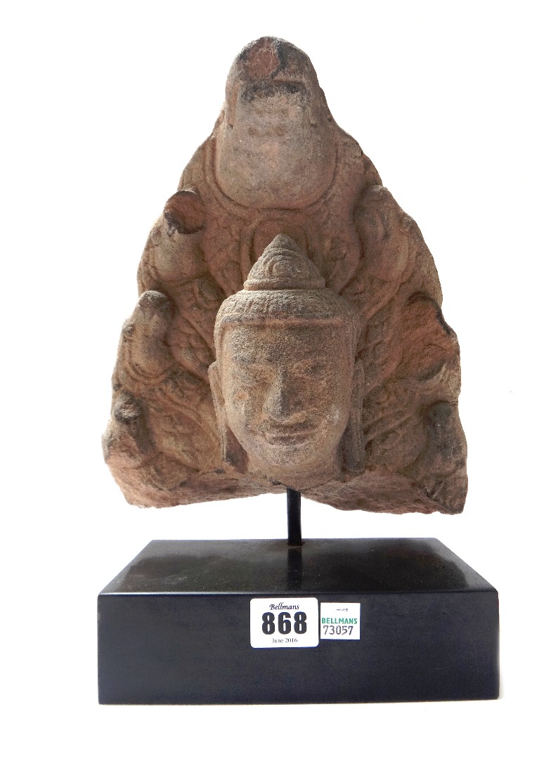 Appraisal: A th century Tibetan stone partial figure head on a