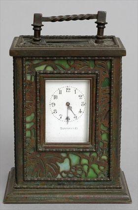 Appraisal: TIFFANY STUDIOS BRONZE AND FAVRILE GLASS DESK CLOCK IN THE