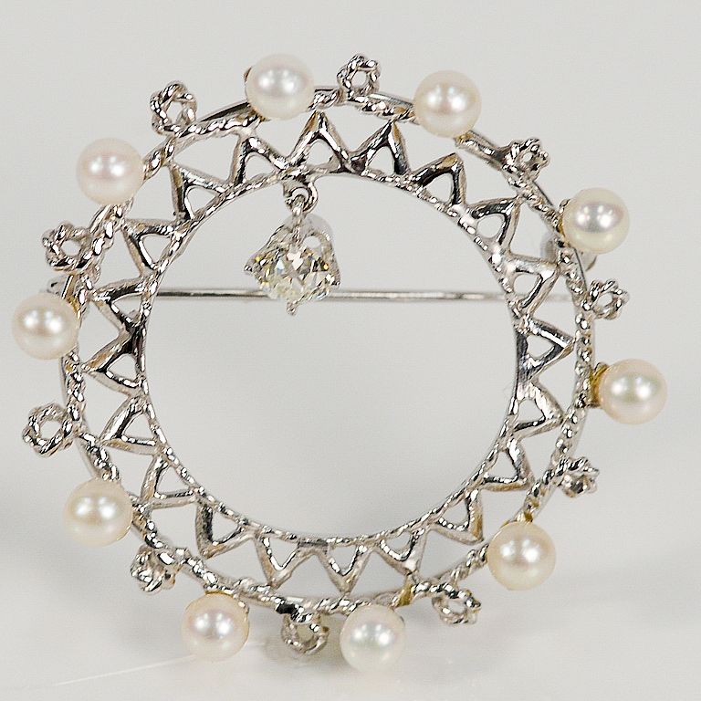 Appraisal: karat circular pin set with pearls and dangle diamonds mm