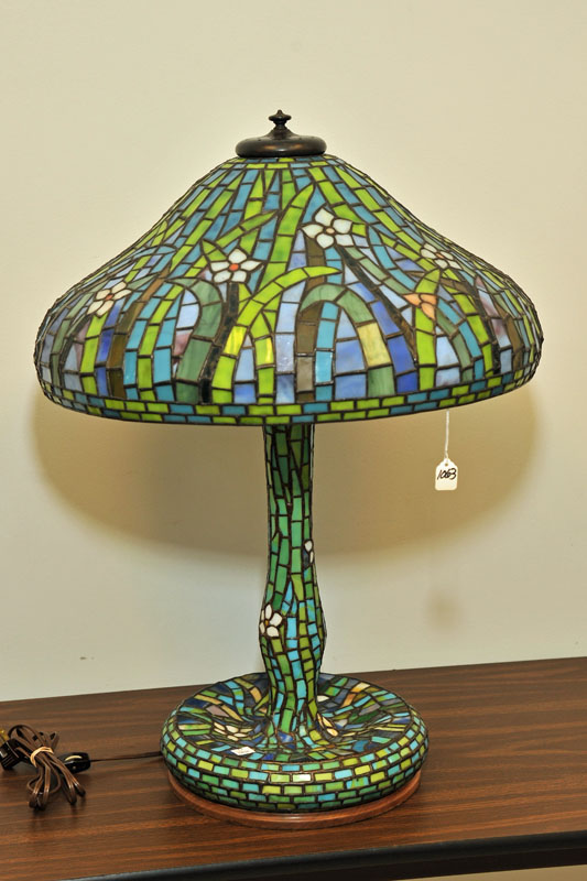 Appraisal: REPRODUCTION LEADED GLASS TABLE LAMP Polychrome leaded and slag glass