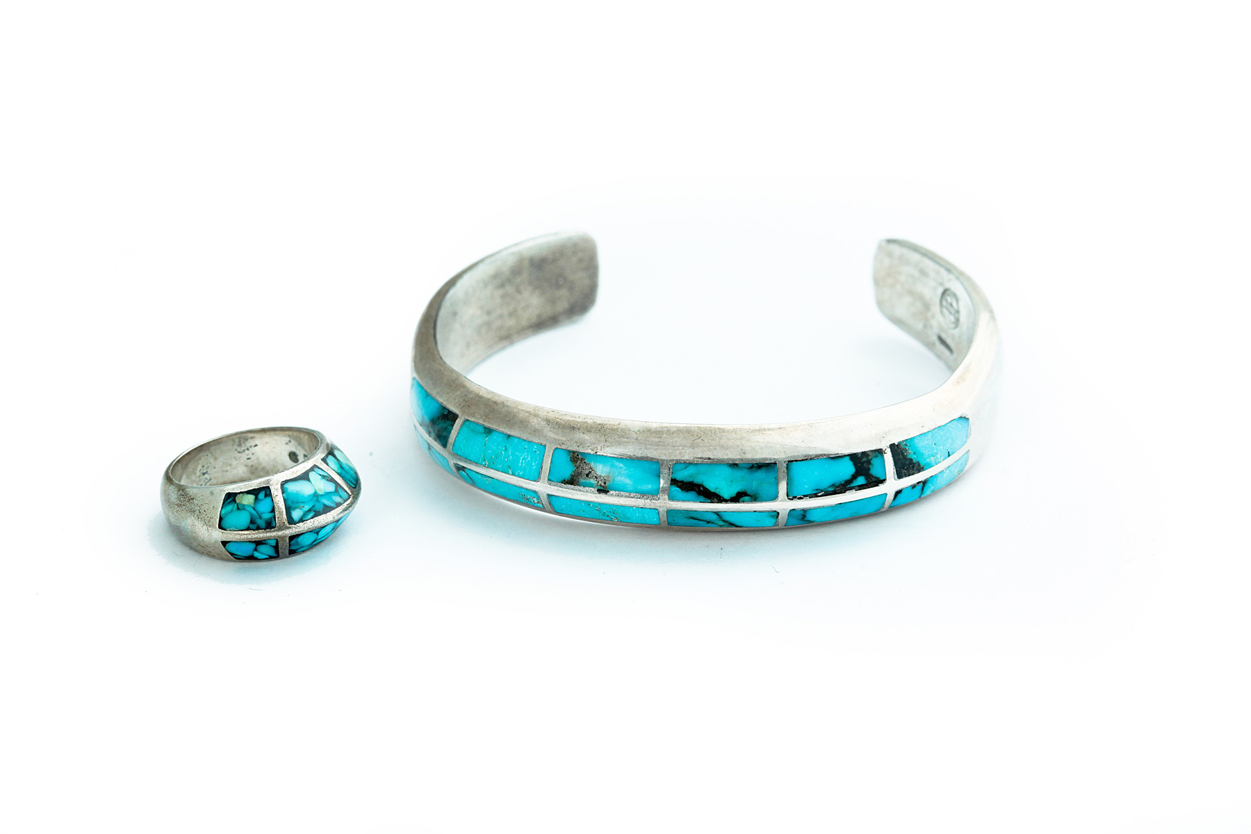 Appraisal: AMERICAN INDIAN SILVER AND TURQUOISE BRACELET AND RING Third quarter-