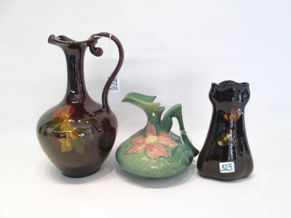 Appraisal: THREE AMERICAN ART POTTERY VESSELS Roseville Clematis ewer - Roseville