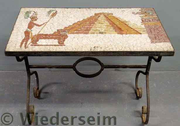 Appraisal: Wrought iron table with an Egyptian motif mosaic tiled top