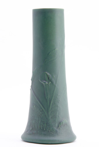 Appraisal: TECO Unusual tapering vase embossed with calla lilies and ferns