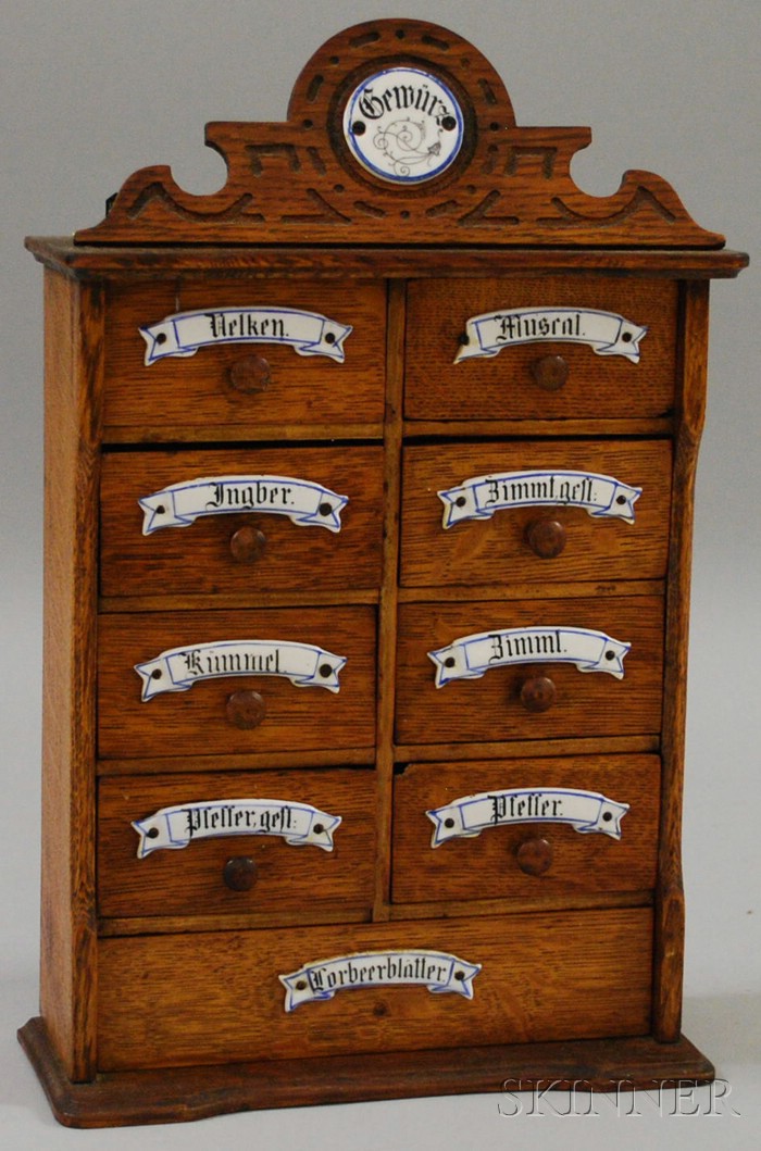 Appraisal: German Oak Nine-Drawer Spice Cabinet late th early th century