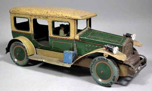 Appraisal: An early th Century tinplate clockwork car ins long x