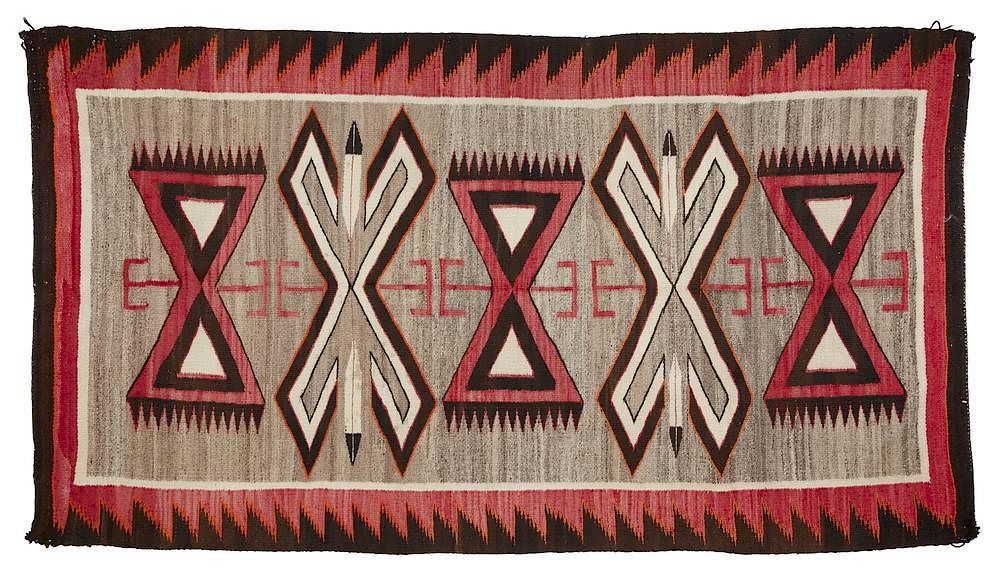 Appraisal: Navajo Blanket Navajo blanket in hues of red tan brown