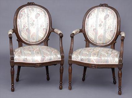 Appraisal: PAIR OF GEORGE III CARVED ARMCHAIRS IN THE FRENCH TASTE