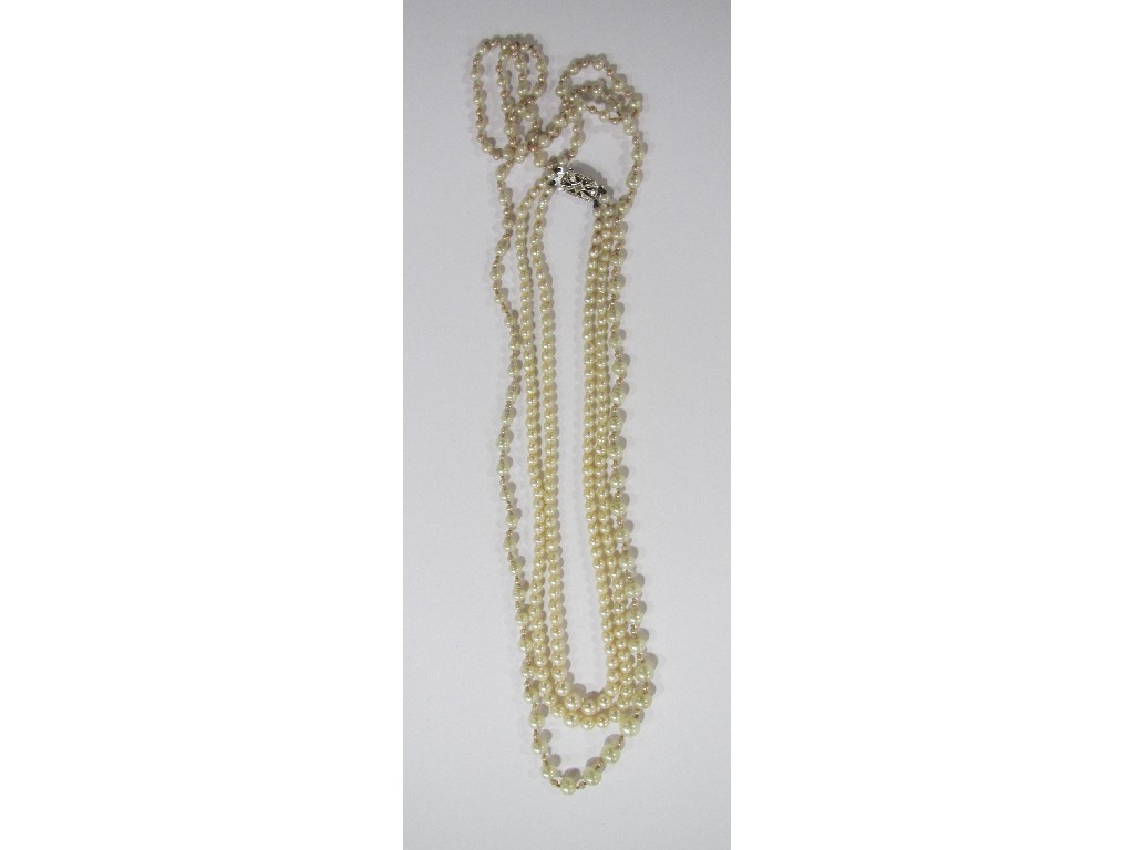 Appraisal: Lot comprising cultured pearl two strand necklace and a long