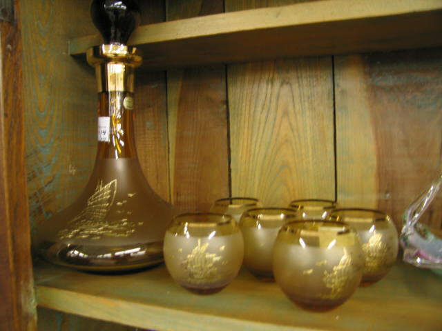 Appraisal: Bohemian Amber Glass Decanter and tumblers gold sailing ship decor